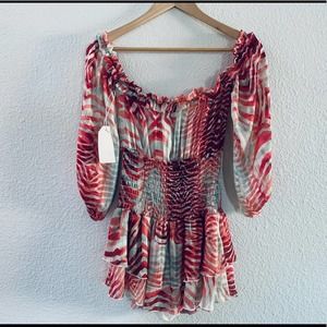 Boutique NWT off shoulder long sleeve pink pattern romper small